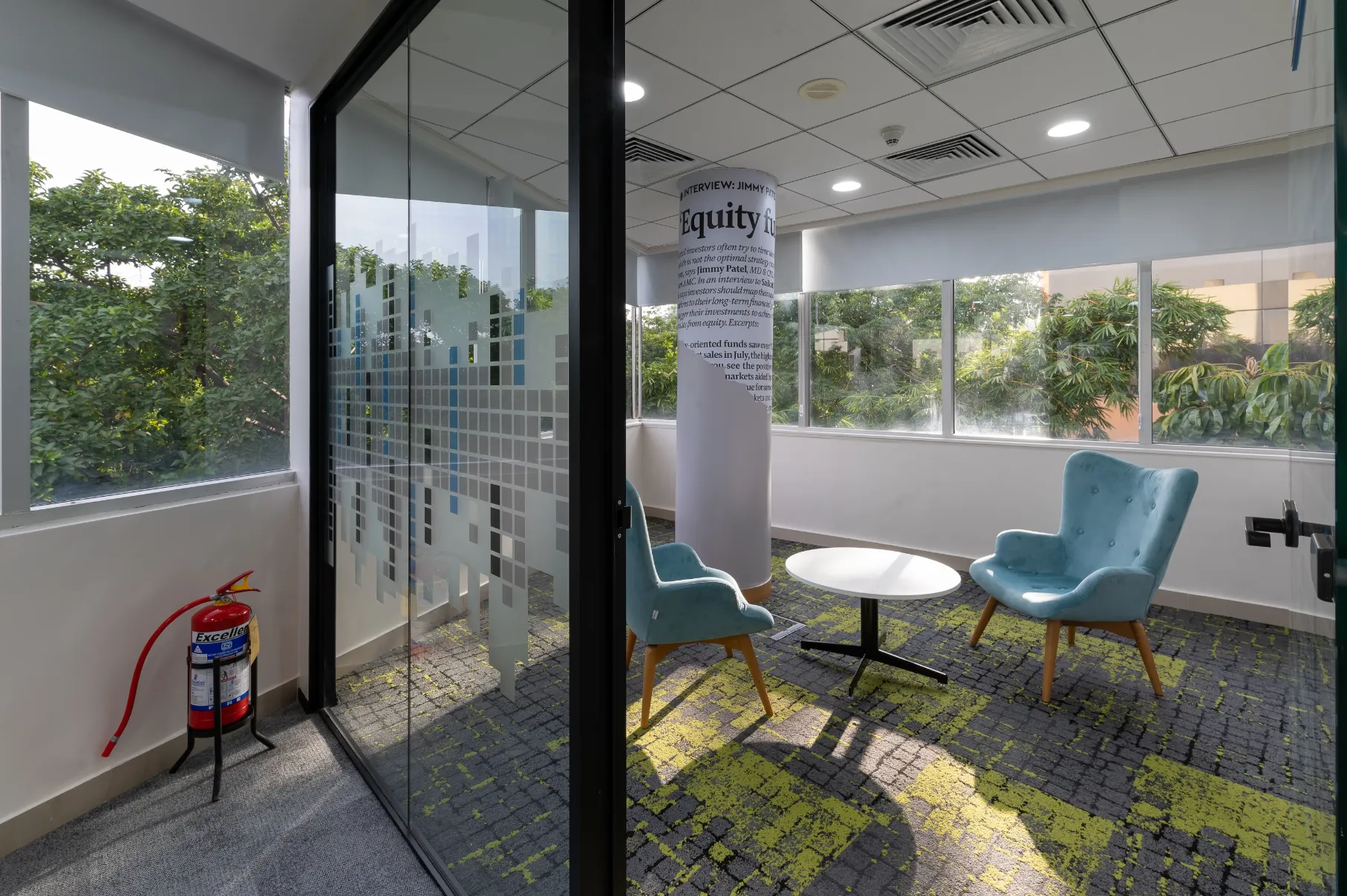 Glass partition wall with corporate film branding