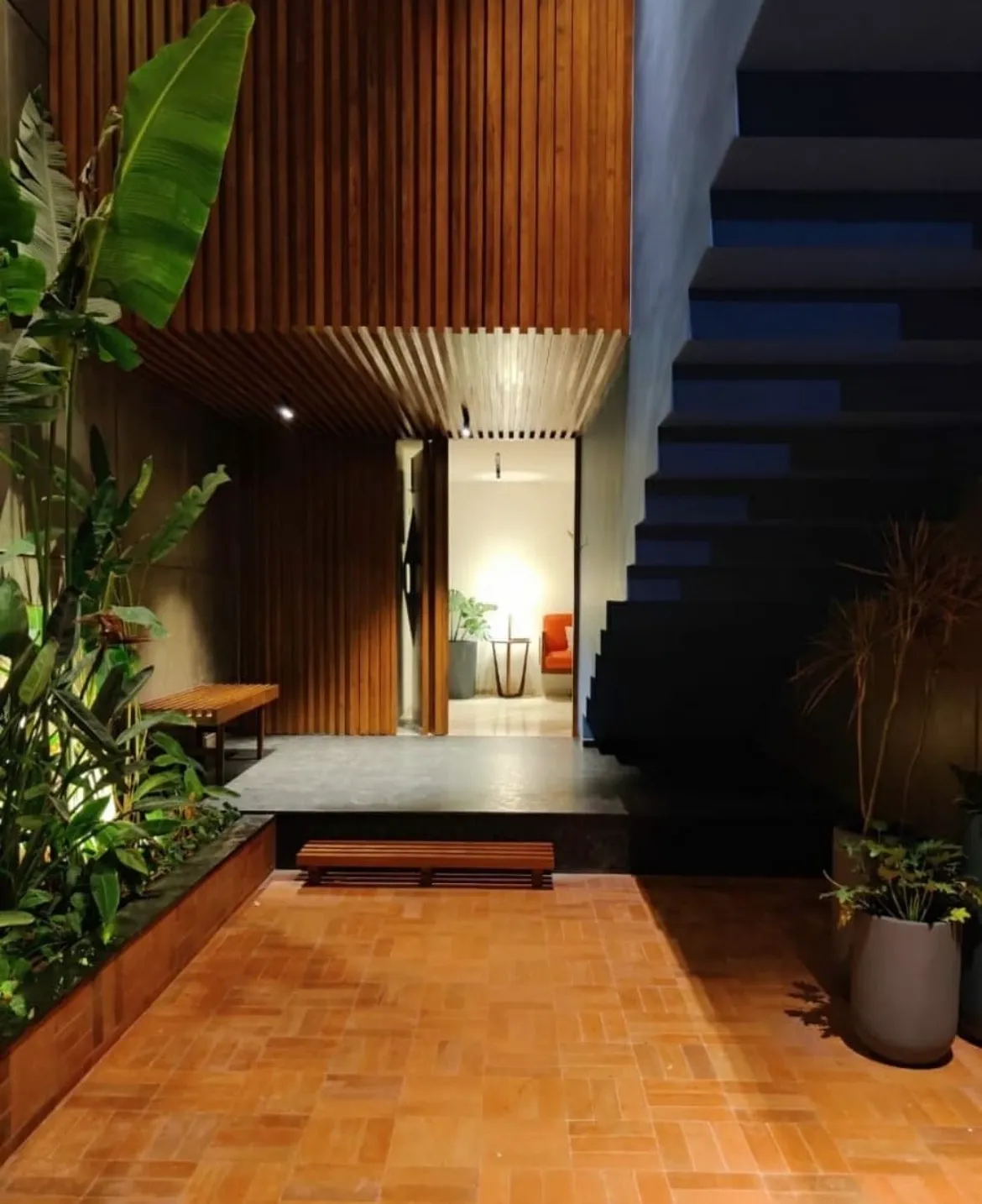 Natural stone clad compound wall and structural landscape